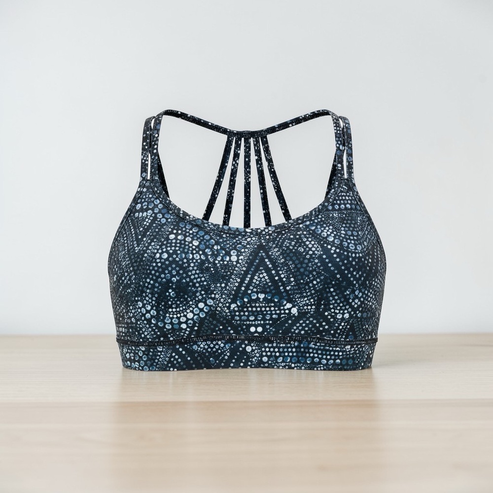 GAIAM Strappy-Back Sports Bra in Black & Blue Dot Print